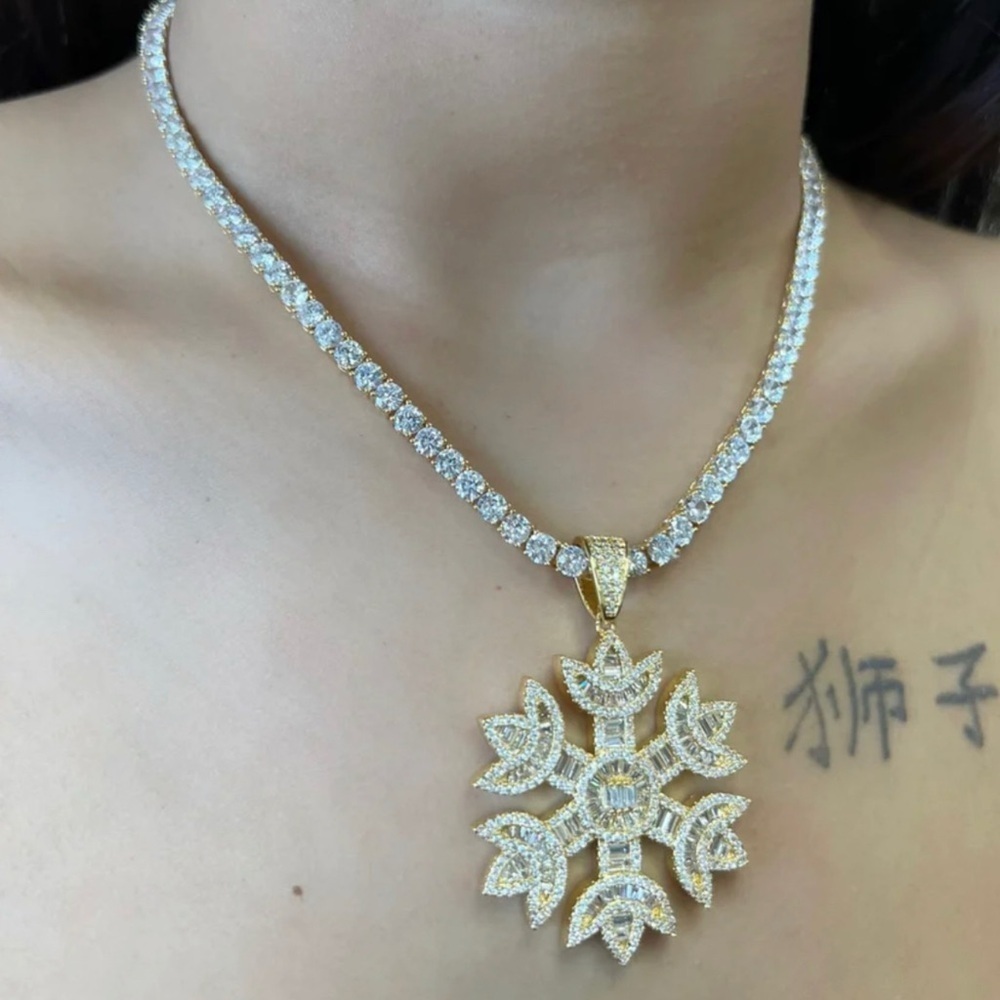Gold snowflake necklace